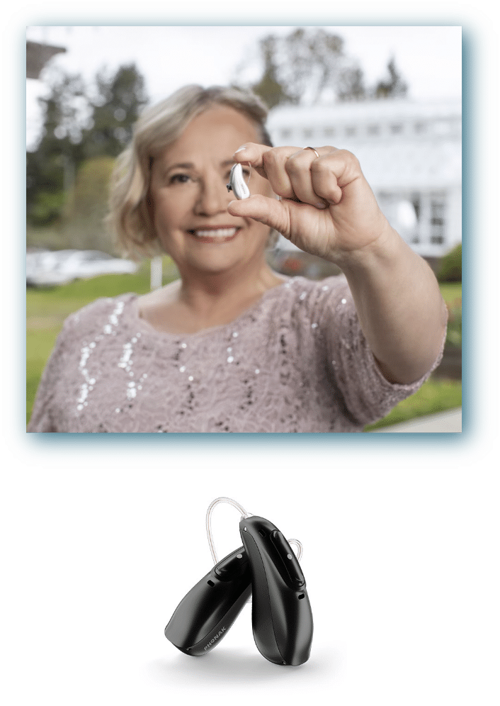 Woman holding the Phonak Audeo hearing aids